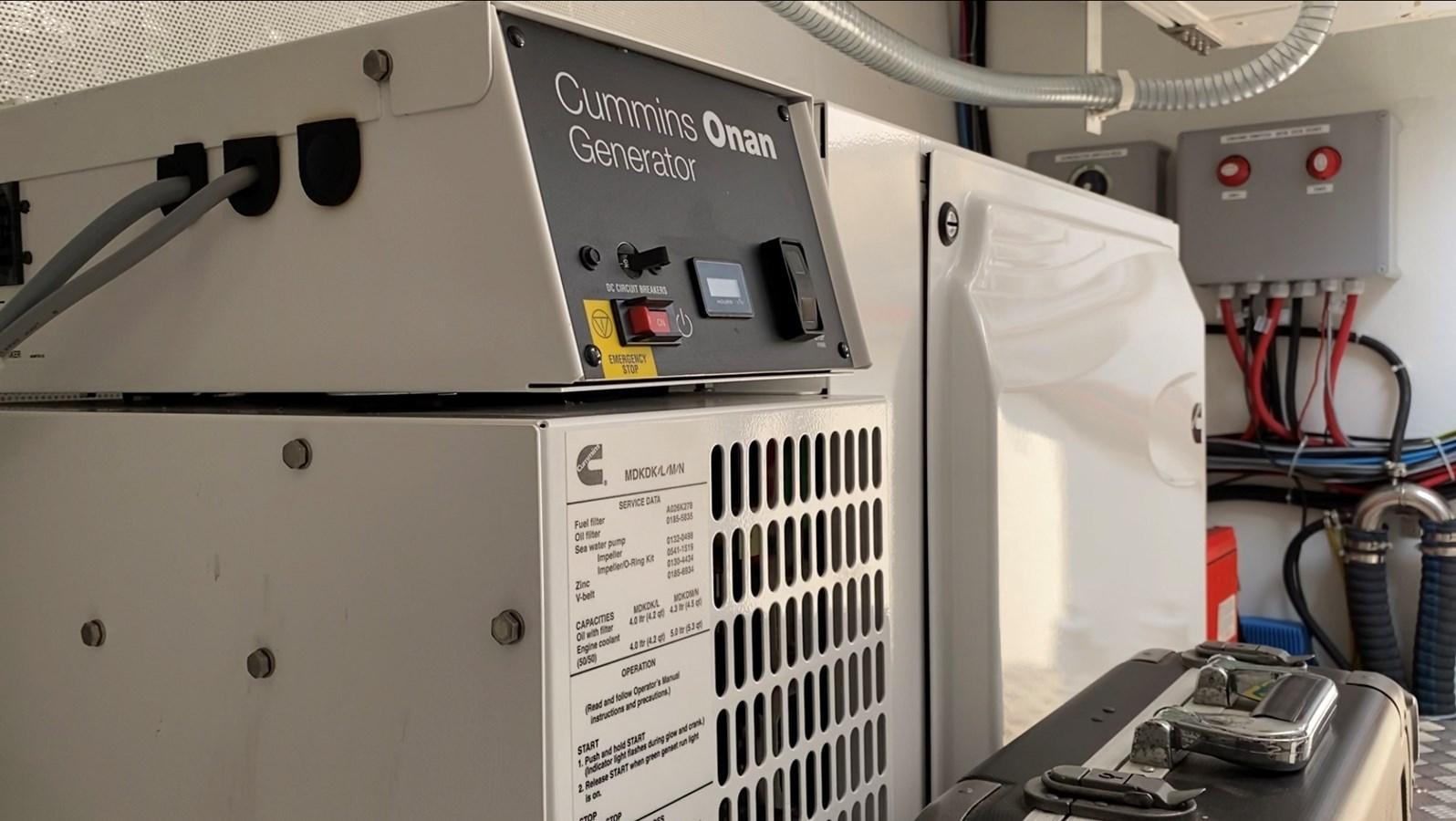 a white machine with a white panel aboard GIJA Yacht for Sale