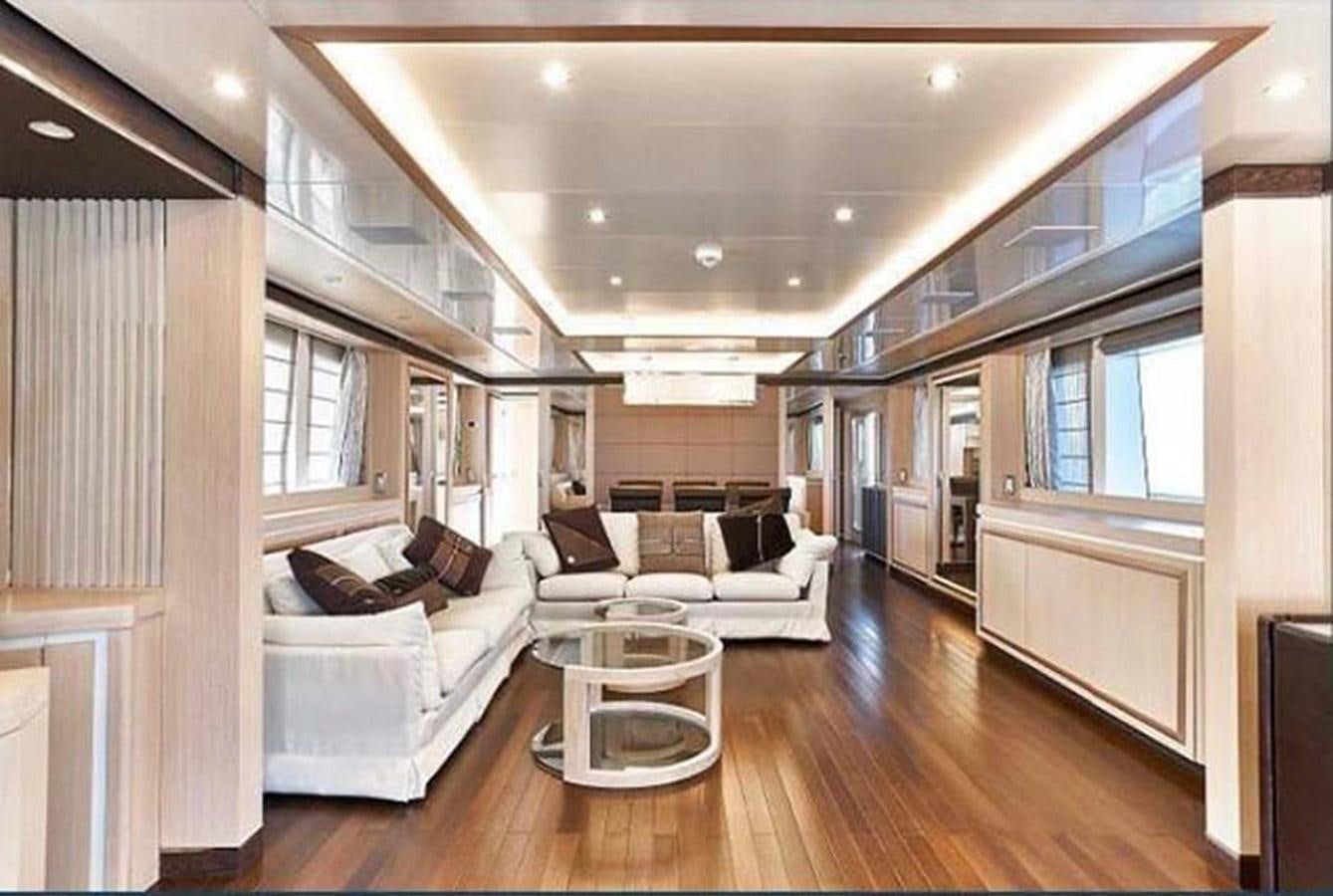 a living room with a wood floor aboard BLUE BERRY Yacht for Sale