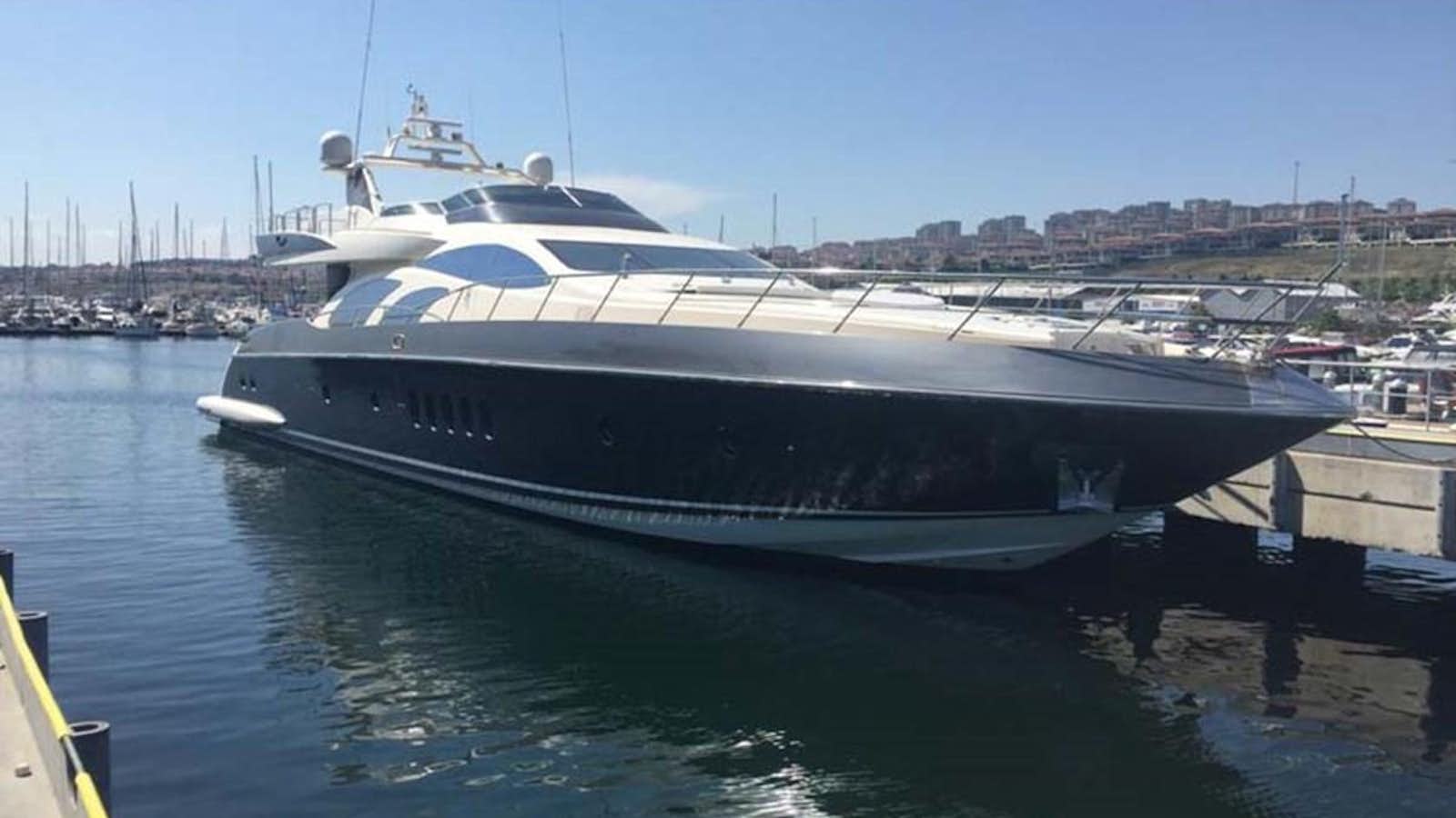 a boat docked at a pier aboard AEGINA Yacht for Sale