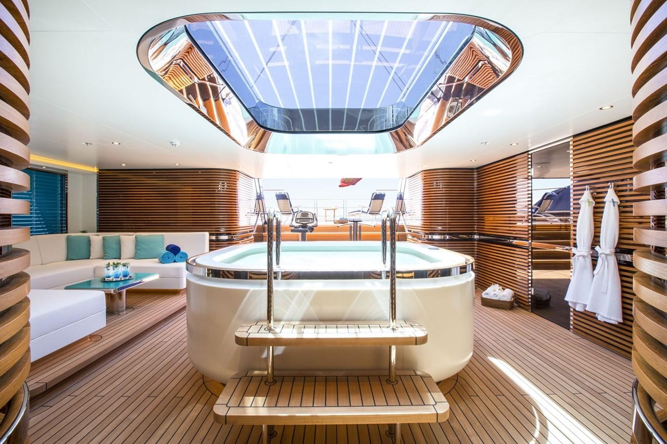 a large room with a large jacuzzi tub aboard AQUIJO Yacht for Sale