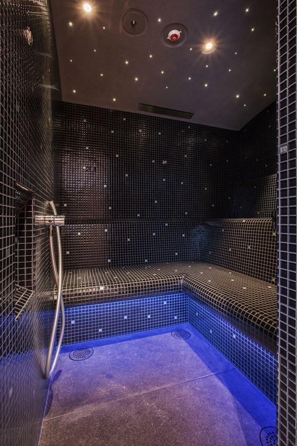 a swimming pool with a large mirror aboard AQUIJO Yacht for Sale