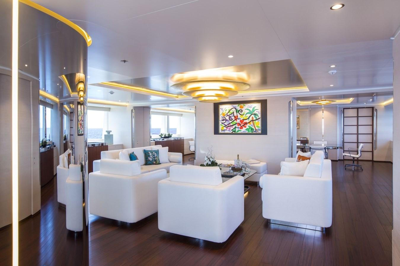 a living room with white furniture aboard AQUIJO Yacht for Sale