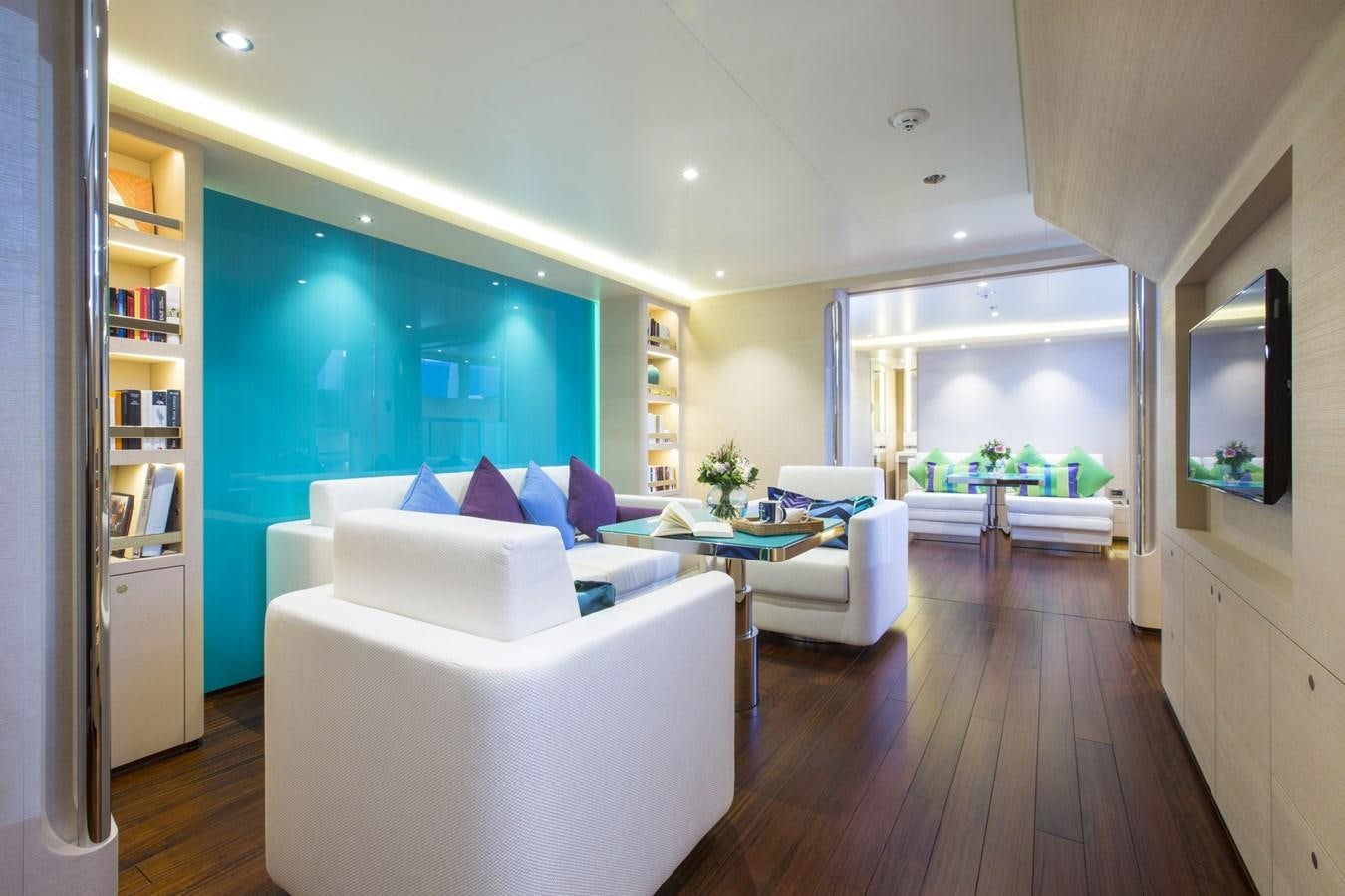 a living room with a large window aboard AQUIJO Yacht for Sale