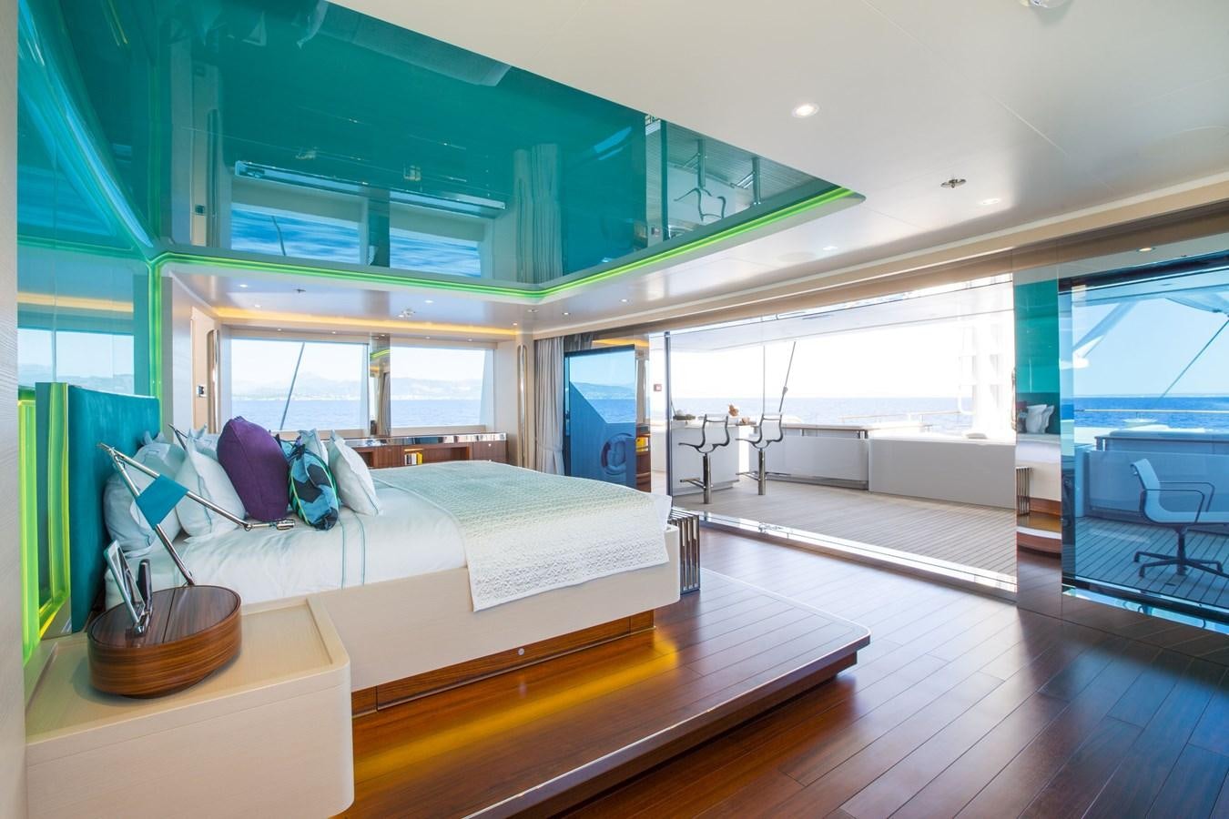 a room with a bed and a table aboard AQUIJO Yacht for Sale