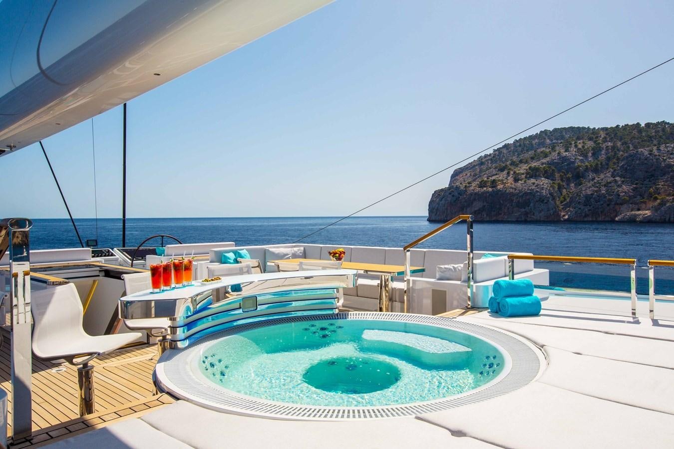 a swimming pool on a deck aboard AQUIJO Yacht for Sale