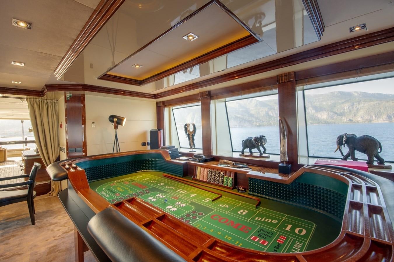 a large room with a pool table aboard ARBEMA Yacht for Charter