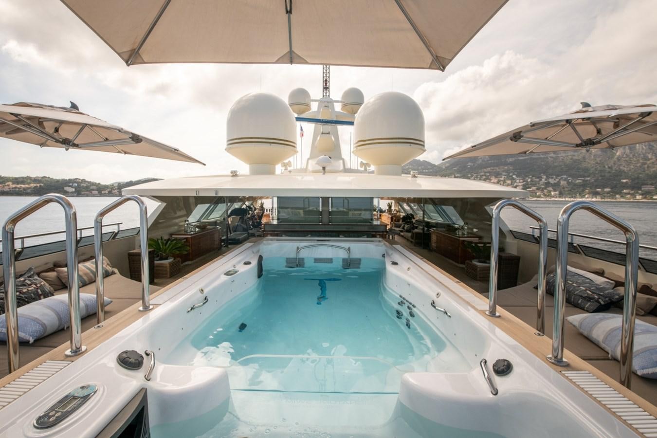 a pool with a large white tent aboard ARBEMA Yacht for Charter