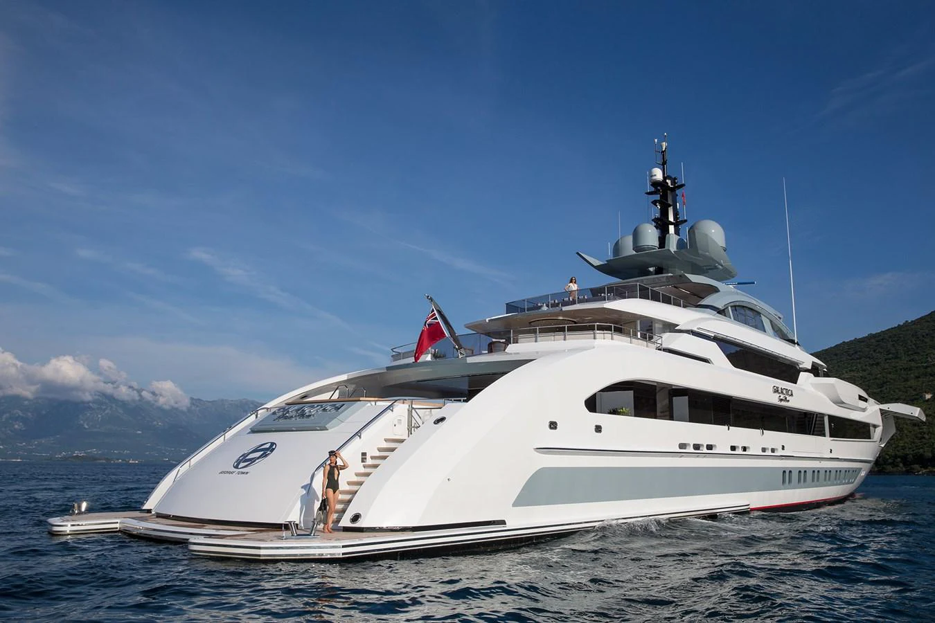 a white yacht on a beach aboard GAJA Yacht for Sale
