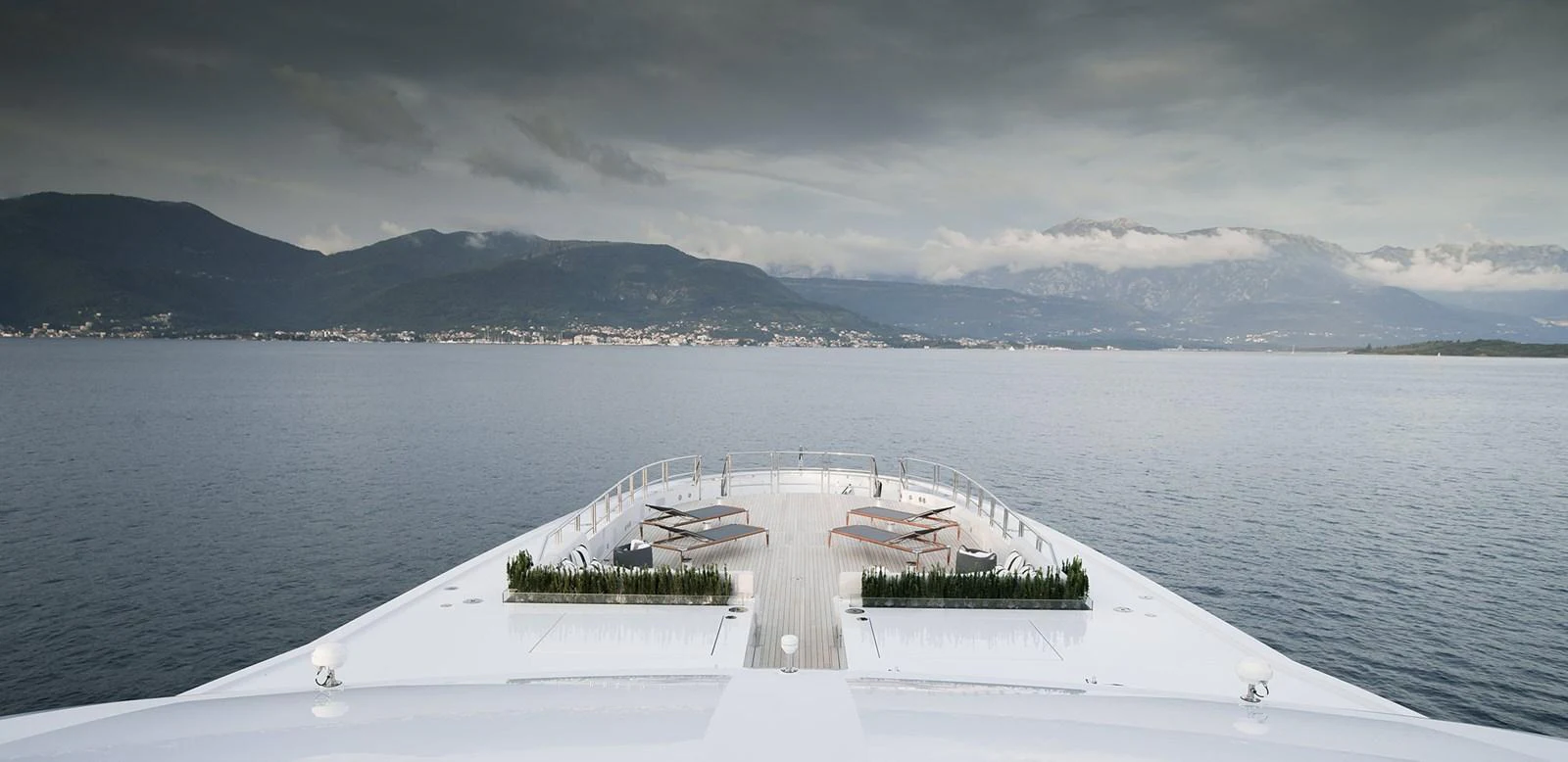 a white boat on a dock aboard GAJA Yacht for Sale