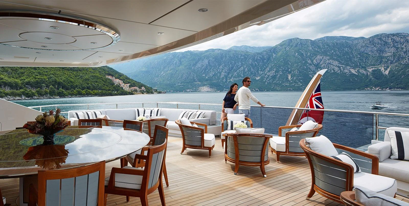 a couple sitting on a boat aboard GAJA Yacht for Sale