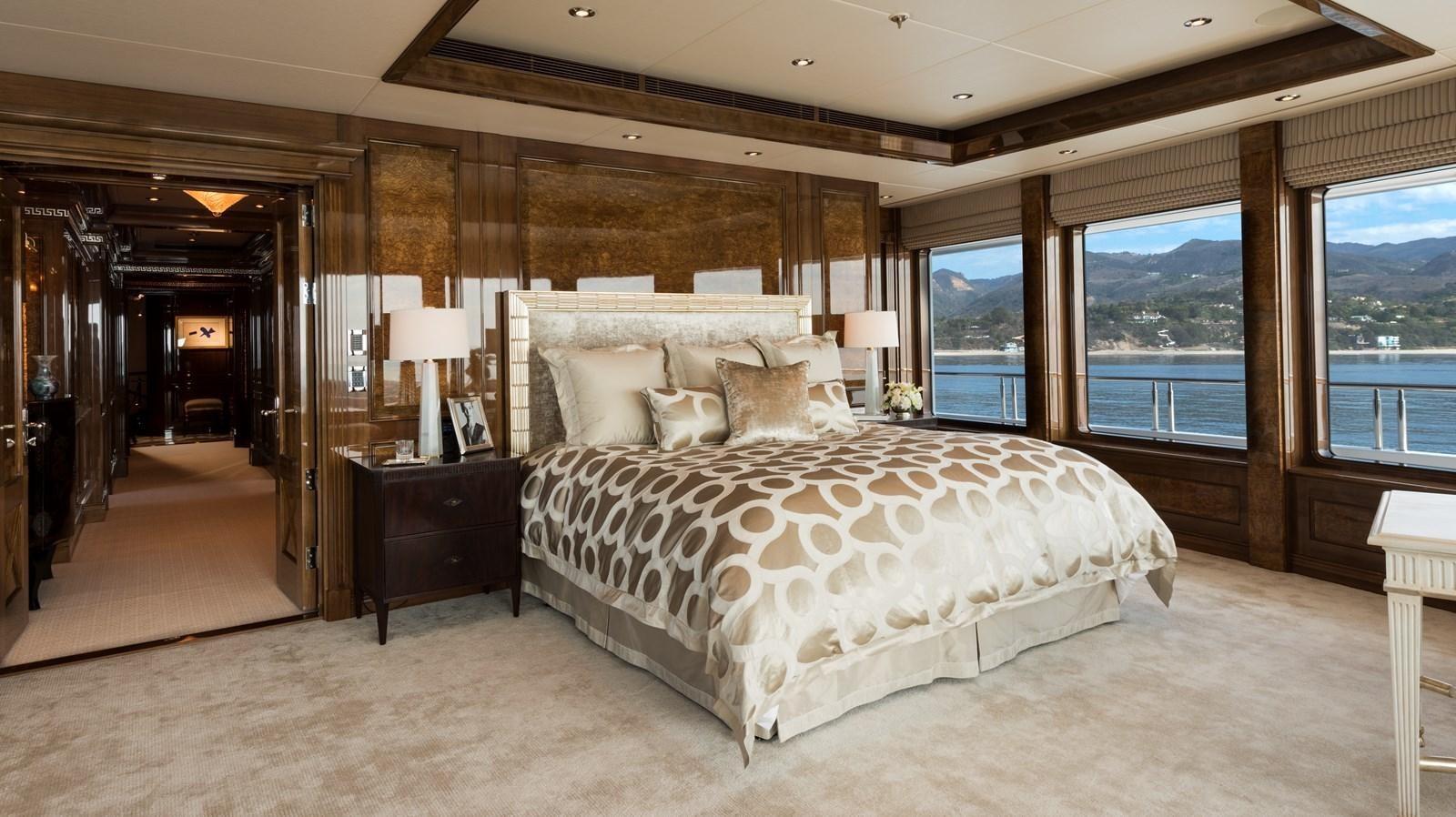 a large bedroom with a large bed aboard INVICTUS Yacht for Sale