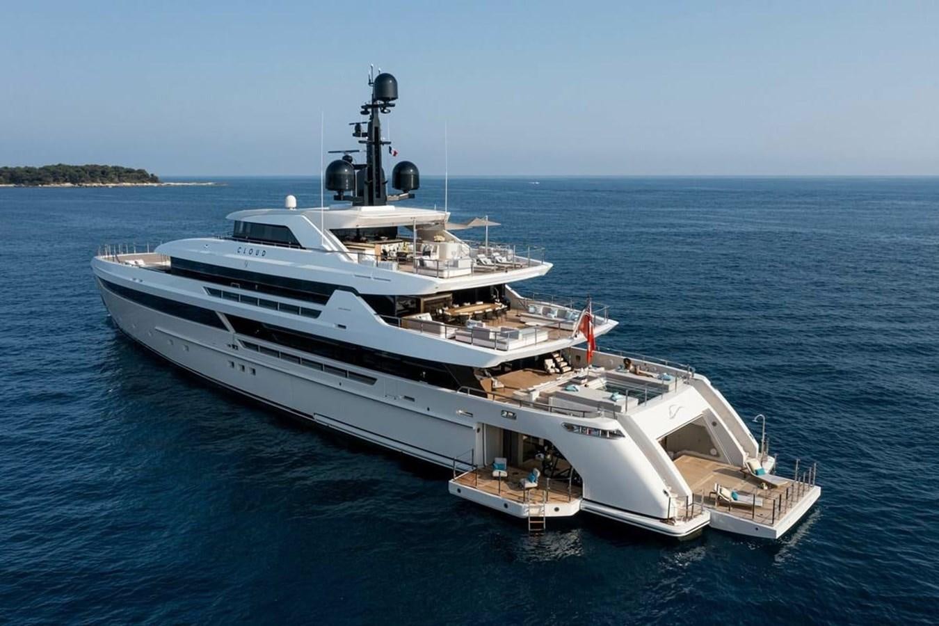 a large white boat in the water aboard LEMON TREE Yacht for Charter