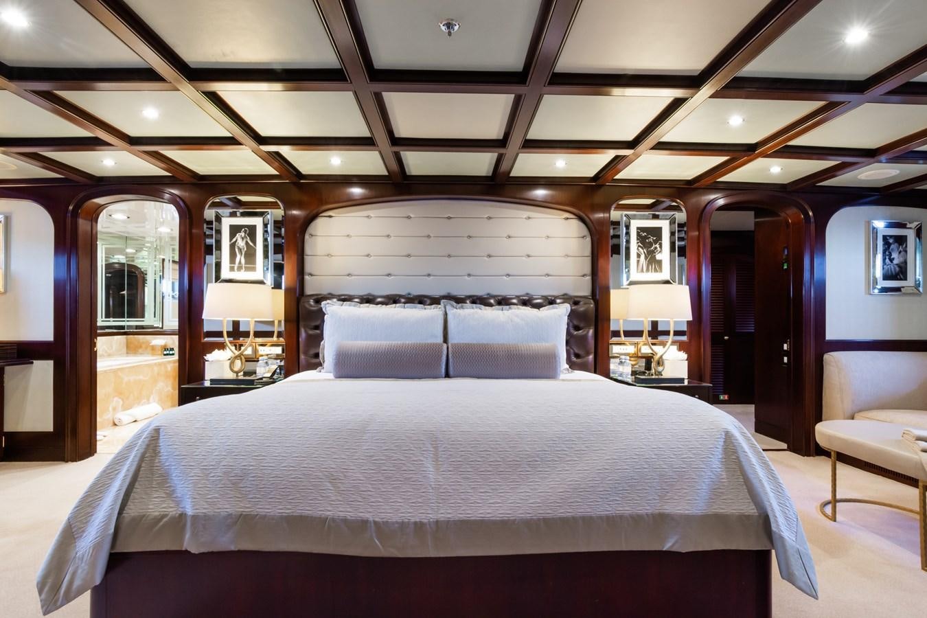 a bed in a room aboard THE WELLESLEY Yacht for Sale