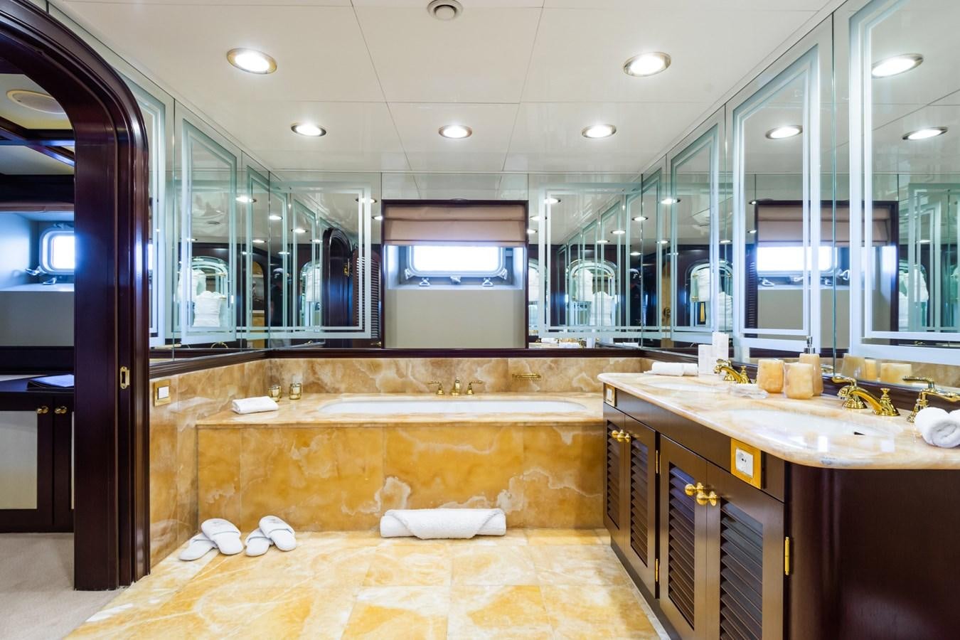 a bathroom with a large tub aboard THE WELLESLEY Yacht for Sale