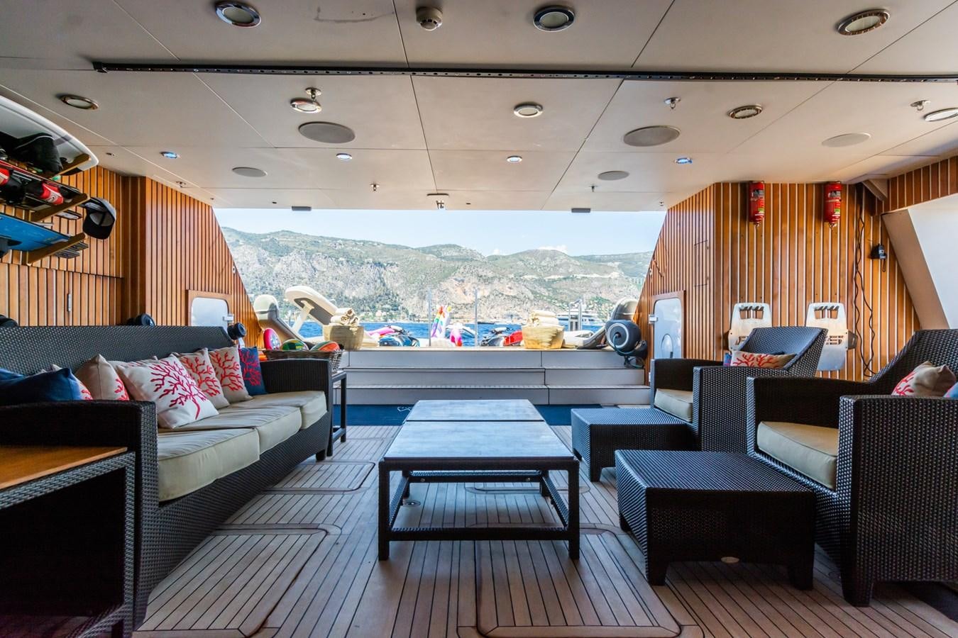a room with a table and chairs aboard THE WELLESLEY Yacht for Sale
