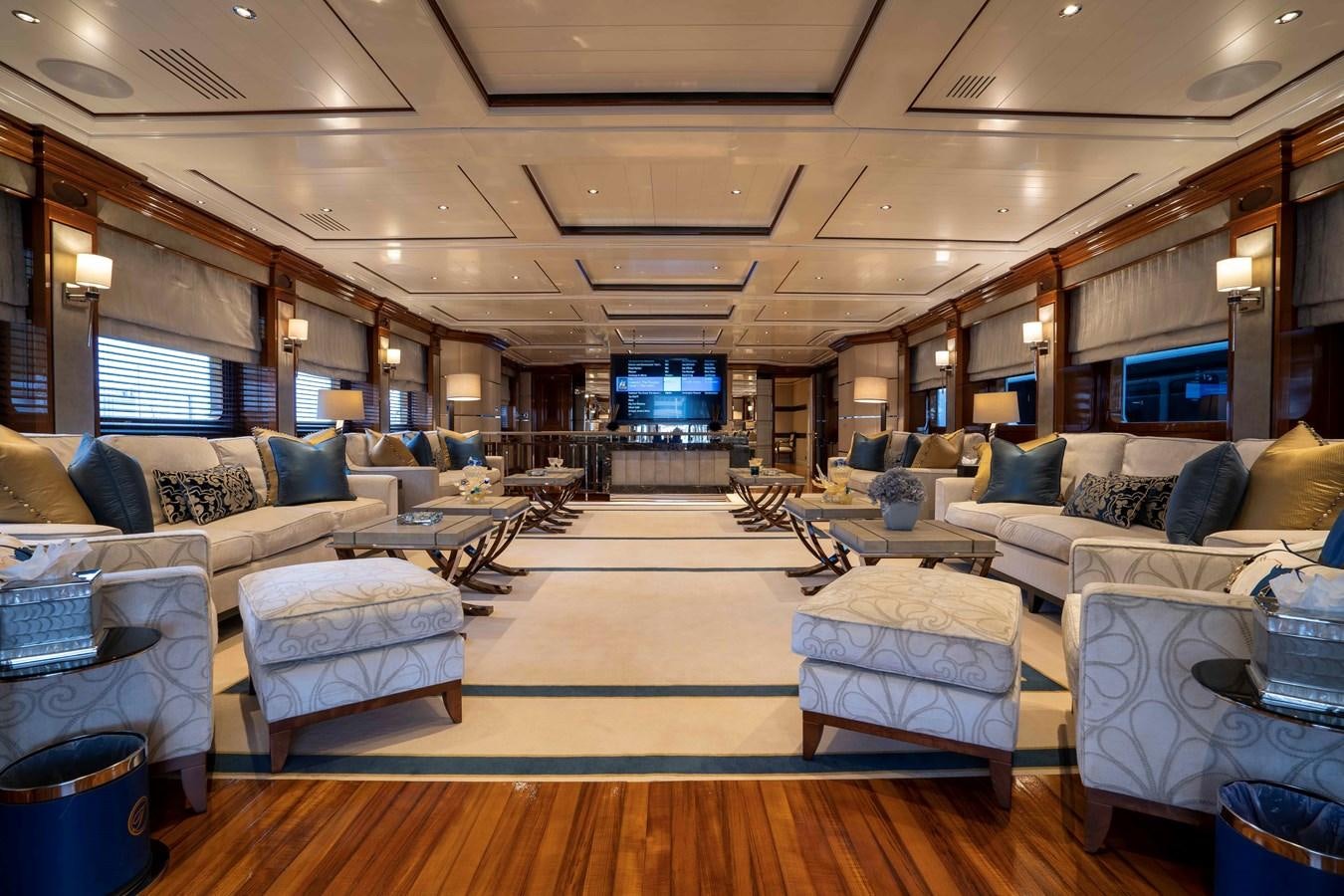 a room with couches and a table aboard TACANUYA Yacht for Charter