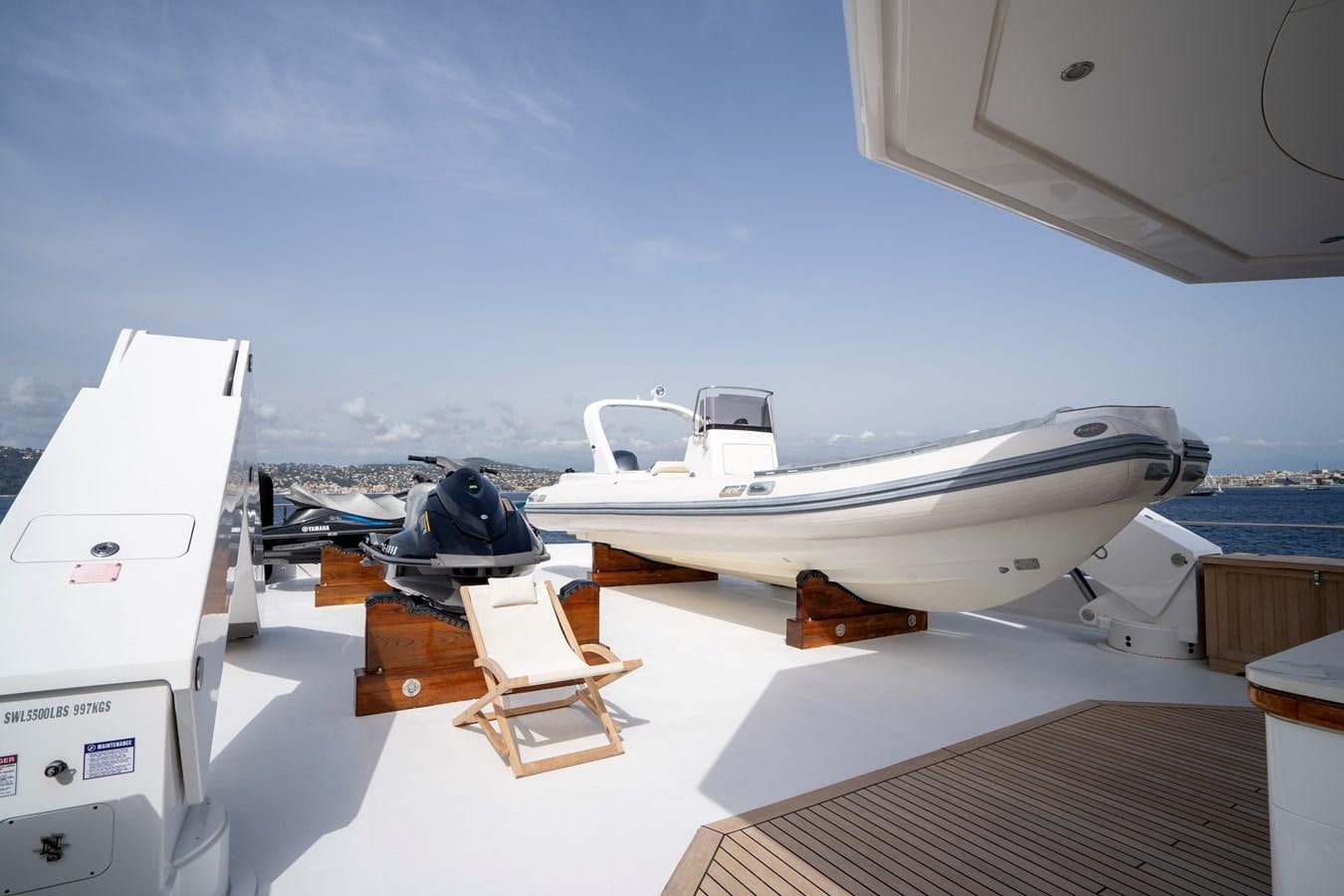 a boat on a deck aboard TACANUYA Yacht for Charter