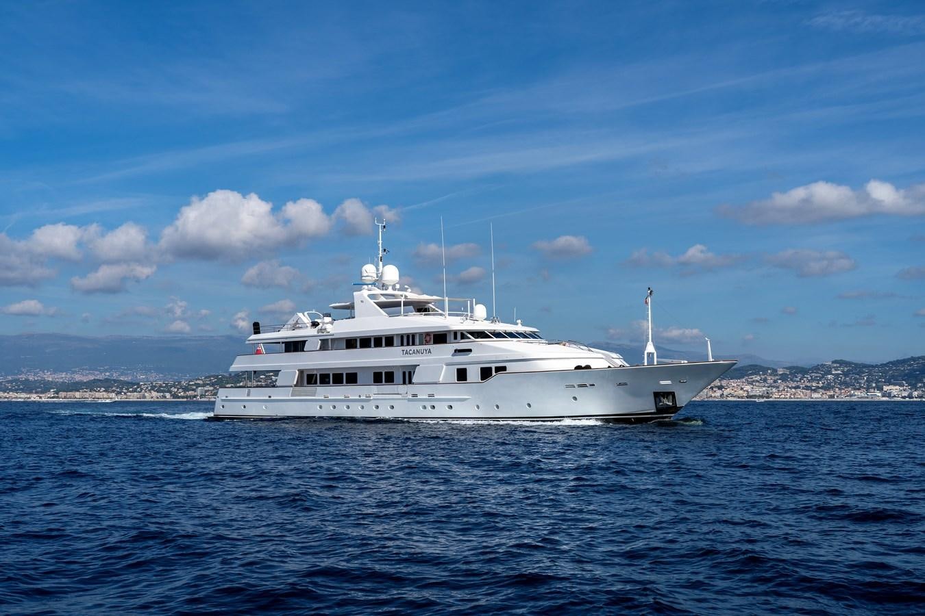 a white boat in the water aboard TACANUYA Yacht for Sale