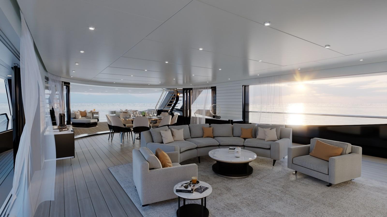a living room with a large white couch and a table aboard PROJECT ATALAY Yacht for Sale