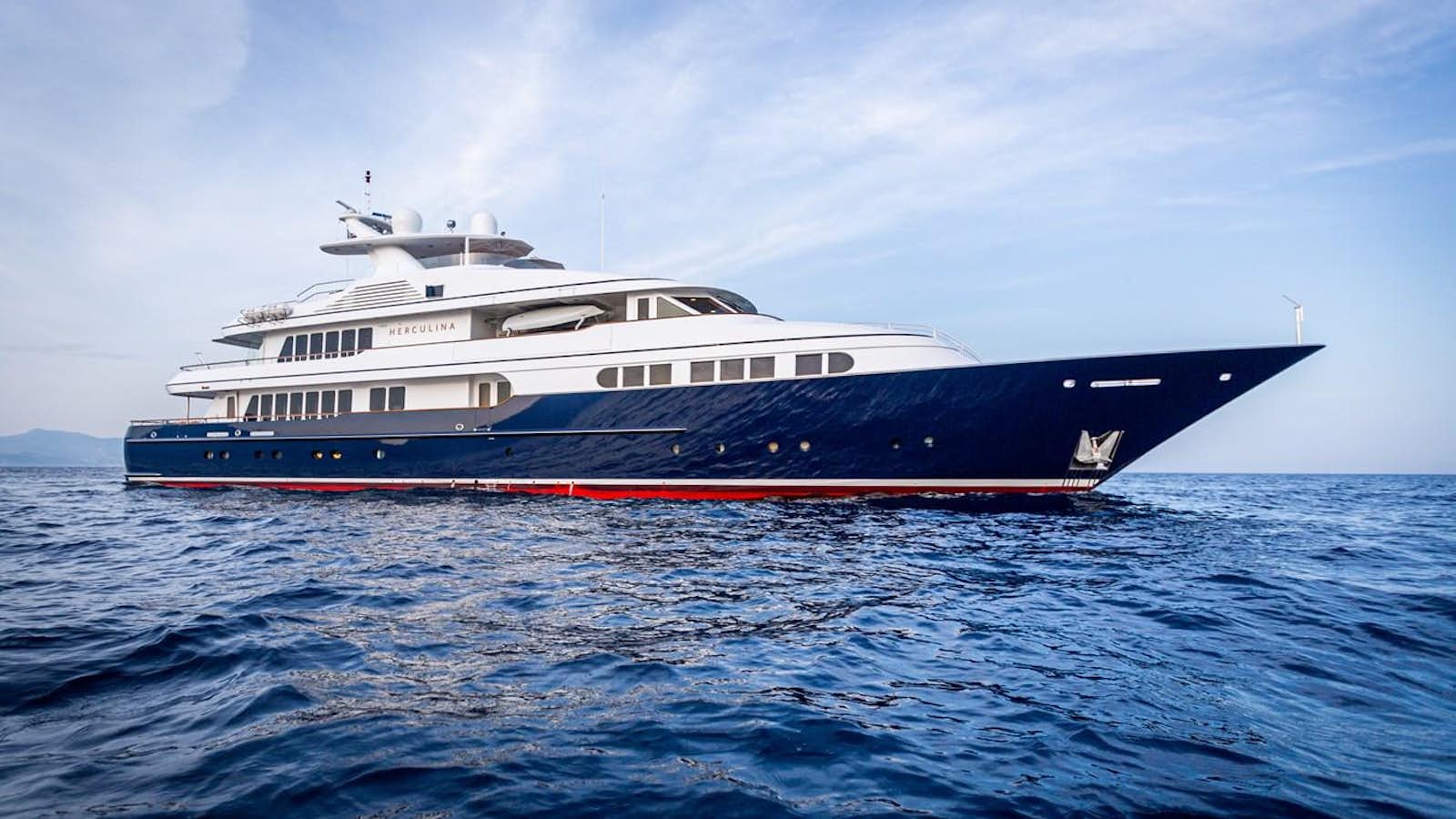 a large ship in the water aboard HERCULES Yacht for Sale