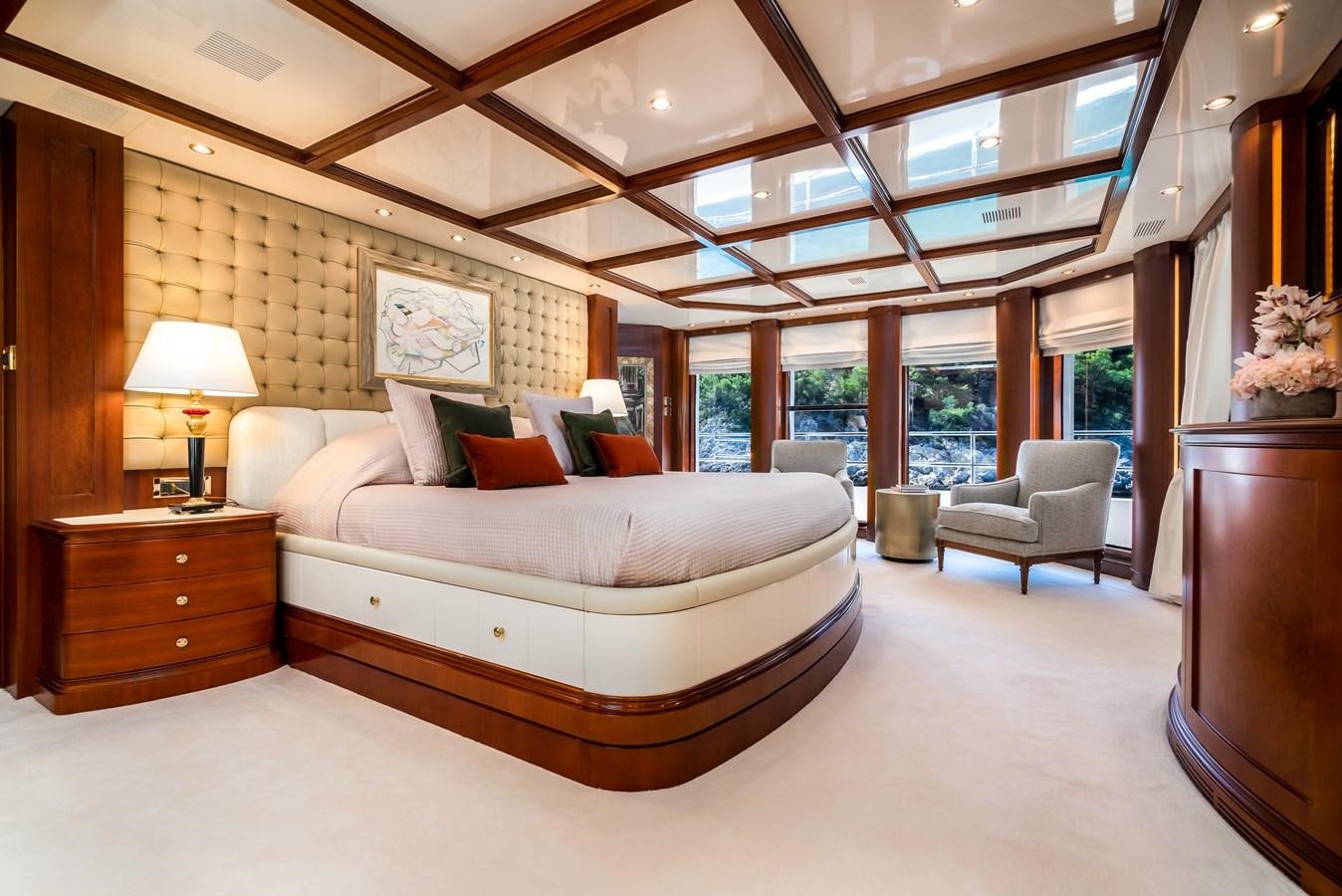 a large bedroom with a large bed aboard OCEANOS Yacht for Sale
