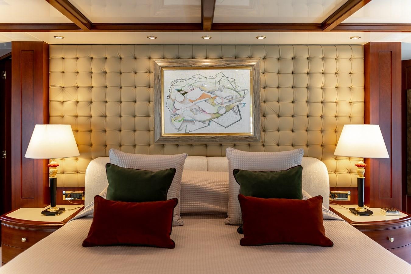 a large bed with pillows aboard OCEANOS Yacht for Sale
