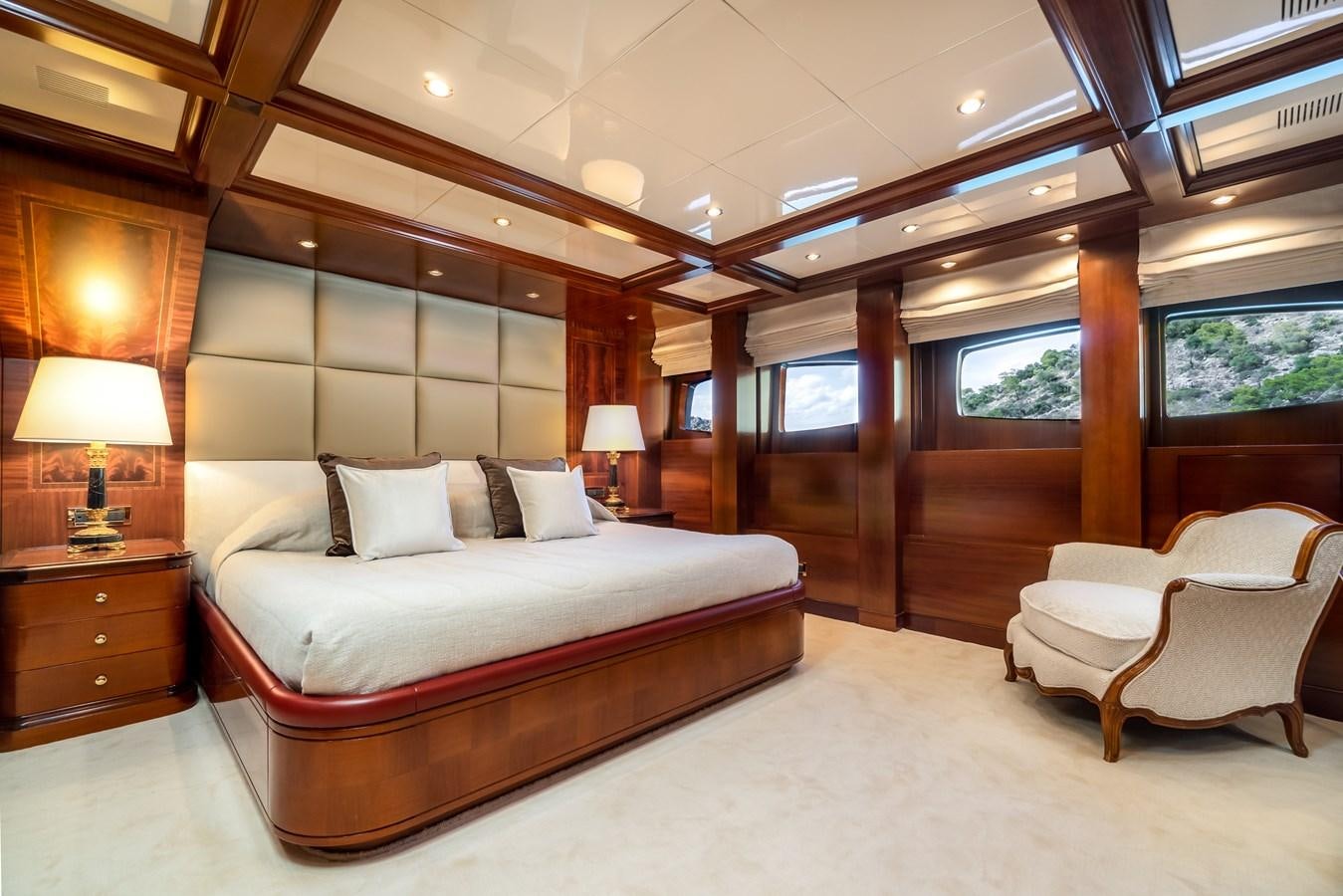 a bed in a room aboard OCEANOS Yacht for Sale