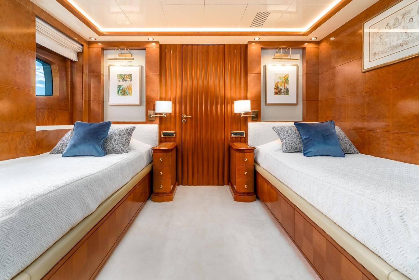 a room with two beds aboard OCEANOS Yacht for Sale