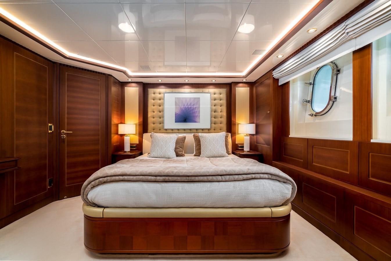 a bed in a room aboard OCEANOS Yacht for Sale