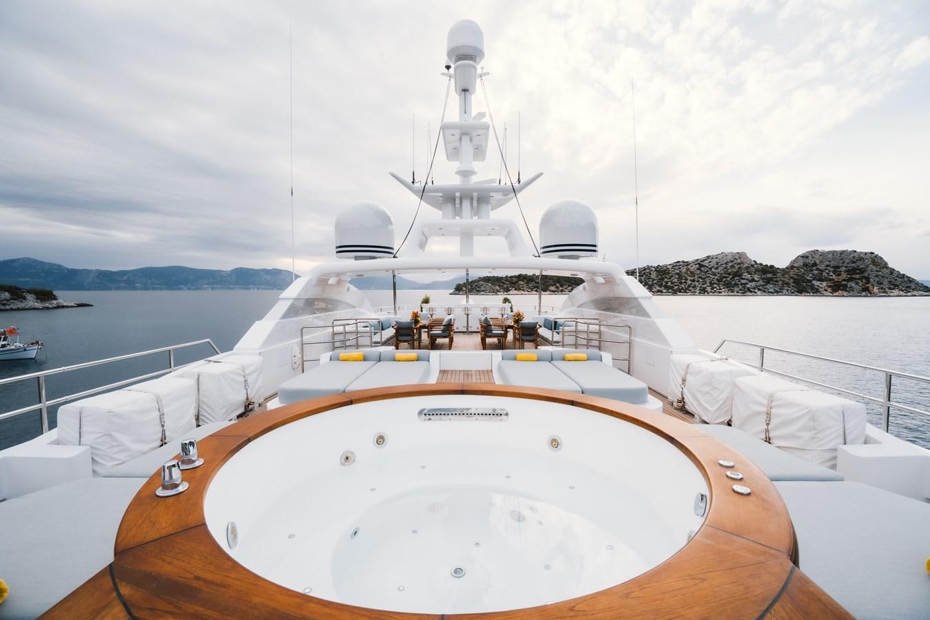 a group of people on a boat aboard OCEANOS Yacht for Sale