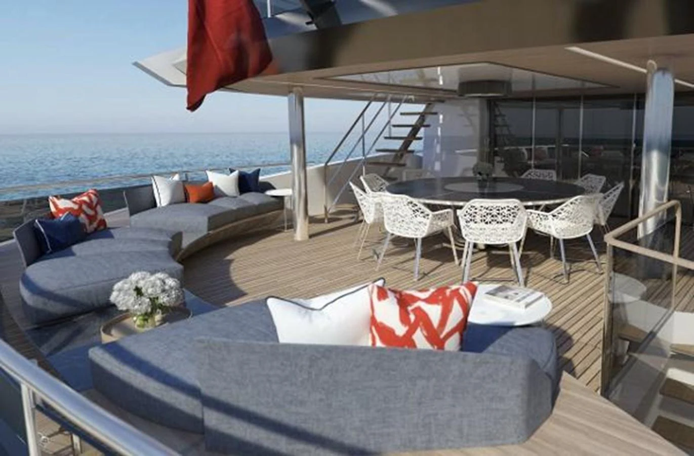 a deck with a large body of water and a couch and chairs aboard 50 METER OCEAN Yacht for Sale