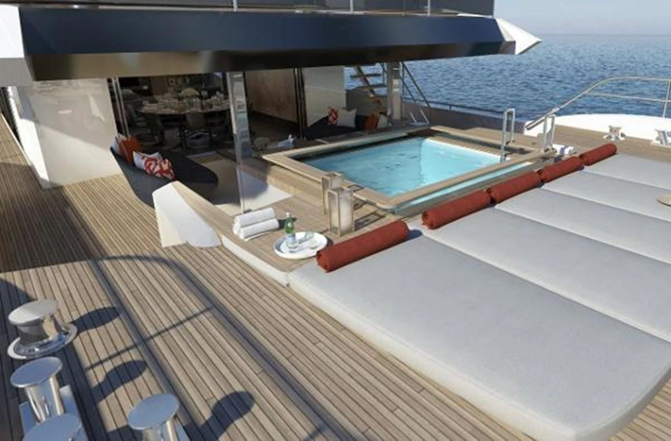 a deck with a pool and a deck and chairs on it aboard 50 METER OCEAN Yacht for Sale