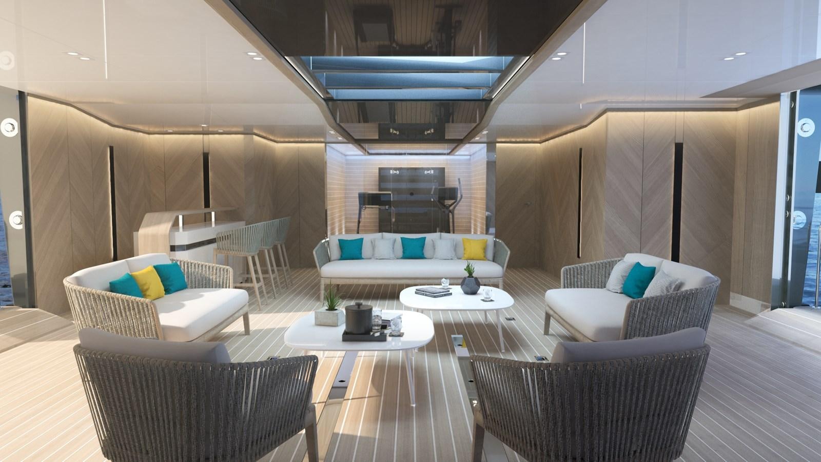 a room with a couch and a table and chairs aboard FL47 Yacht for Sale