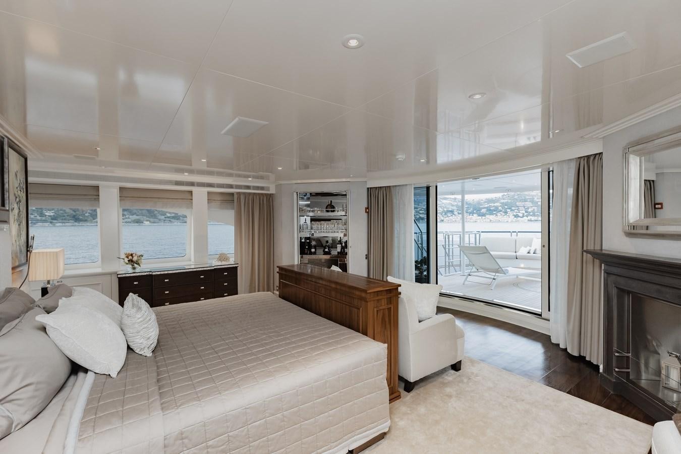 a bedroom with a large bed aboard IDEFIX II Yacht for Charter