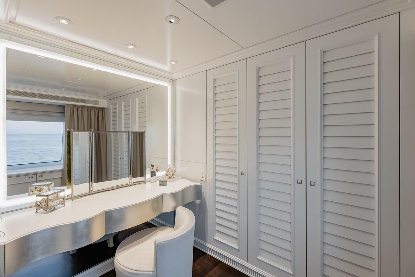 a bathroom with a large closet aboard IDEFIX II Yacht for Charter