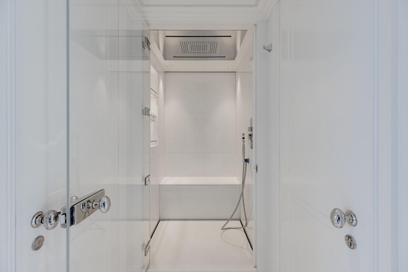 a white cabinet with a vent aboard IDEFIX II Yacht for Charter