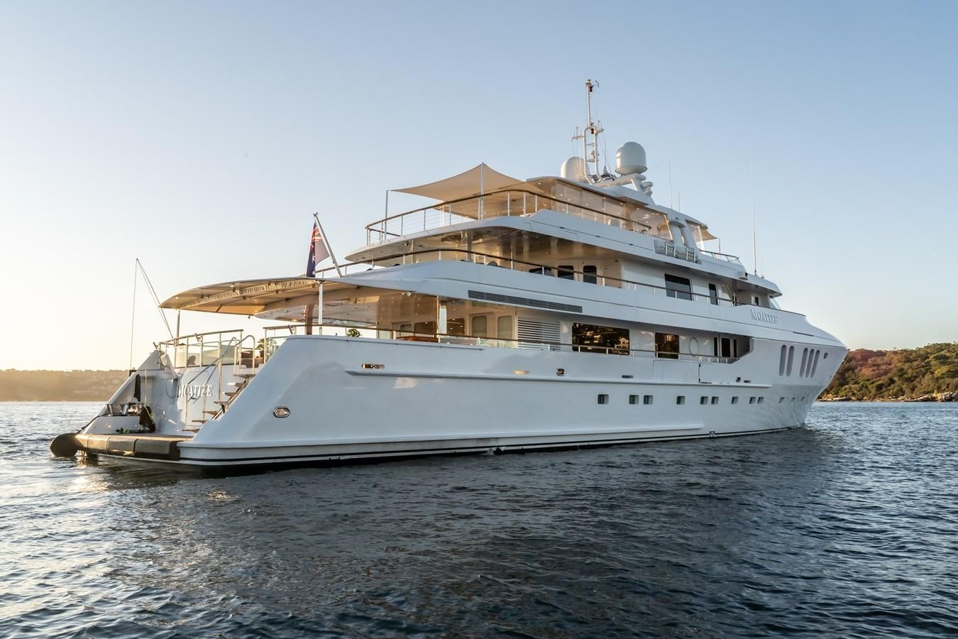 a large white boat on the water aboard MOATIZE Yacht for Sale