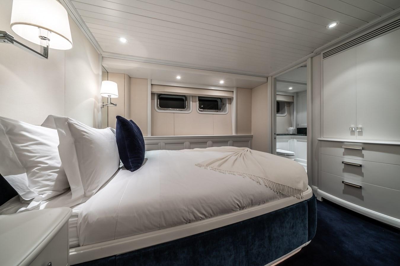 a bed in a room aboard MOATIZE Yacht for Sale