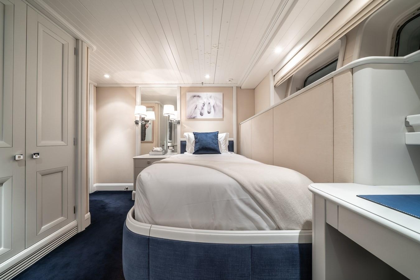a room with two beds aboard MOATIZE Yacht for Sale