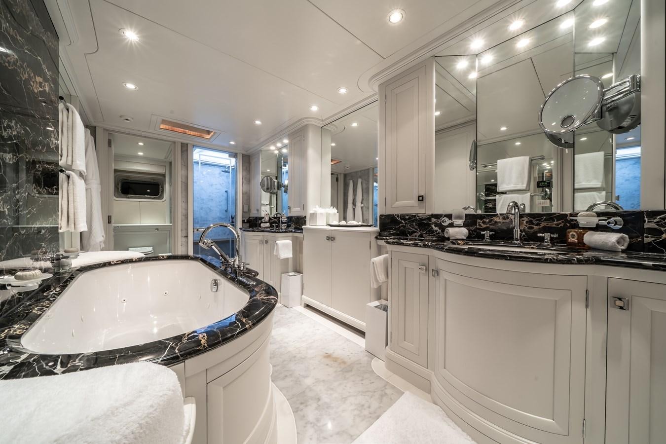 a bathroom with a large tub aboard MOATIZE Yacht for Sale