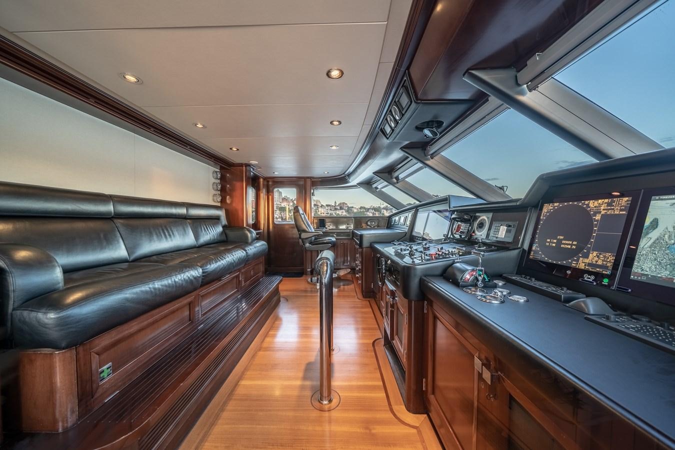a room with a couch and a computer aboard MOATIZE Yacht for Sale