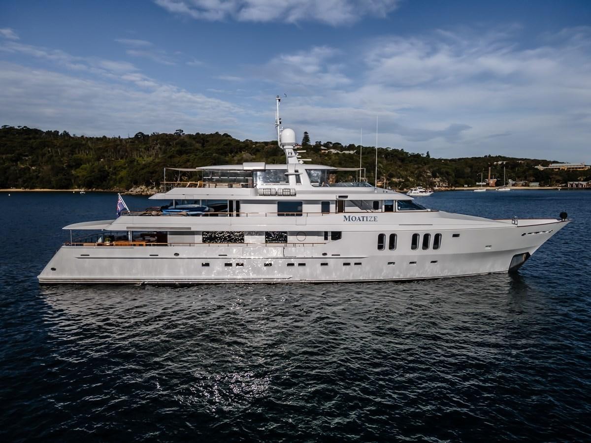 a large white boat on the water aboard MOATIZE Yacht for Sale