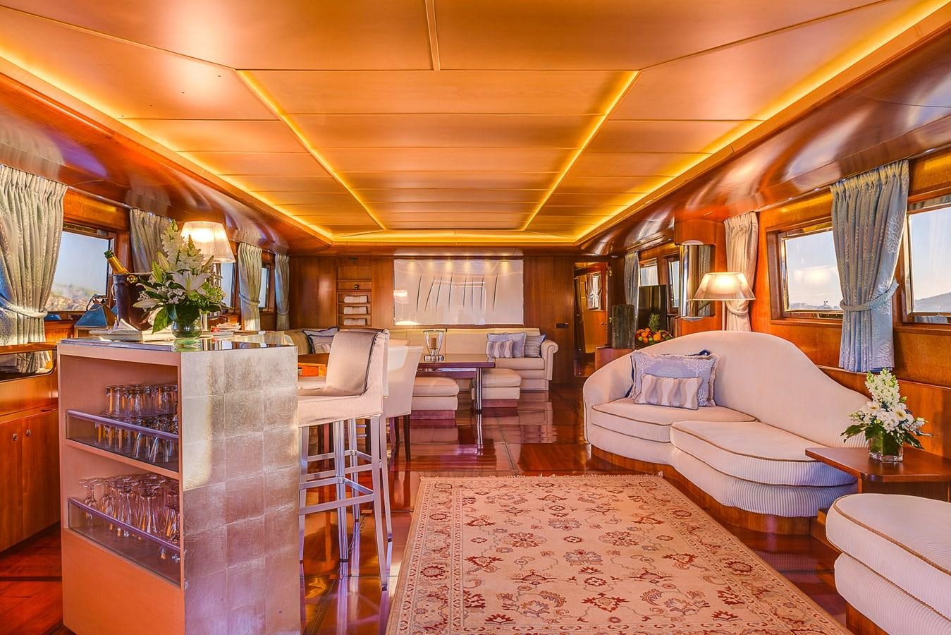 a room with a bed and a desk aboard CD TWO Yacht for Sale