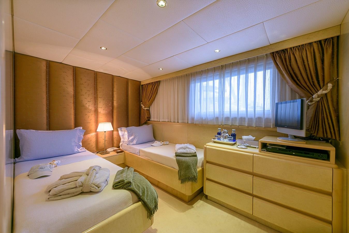 a room with two beds aboard CD TWO Yacht for Sale