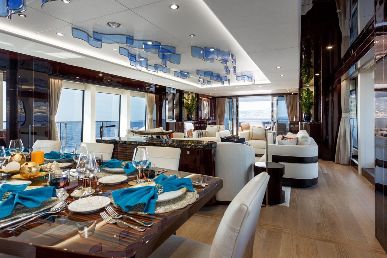 a dining room with a table and chairs aboard NO.9 Yacht for Charter