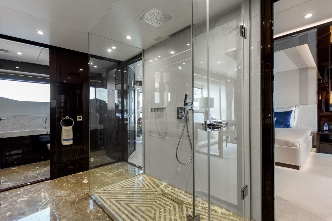 a large glass shower unit aboard NO.9 Yacht for Charter