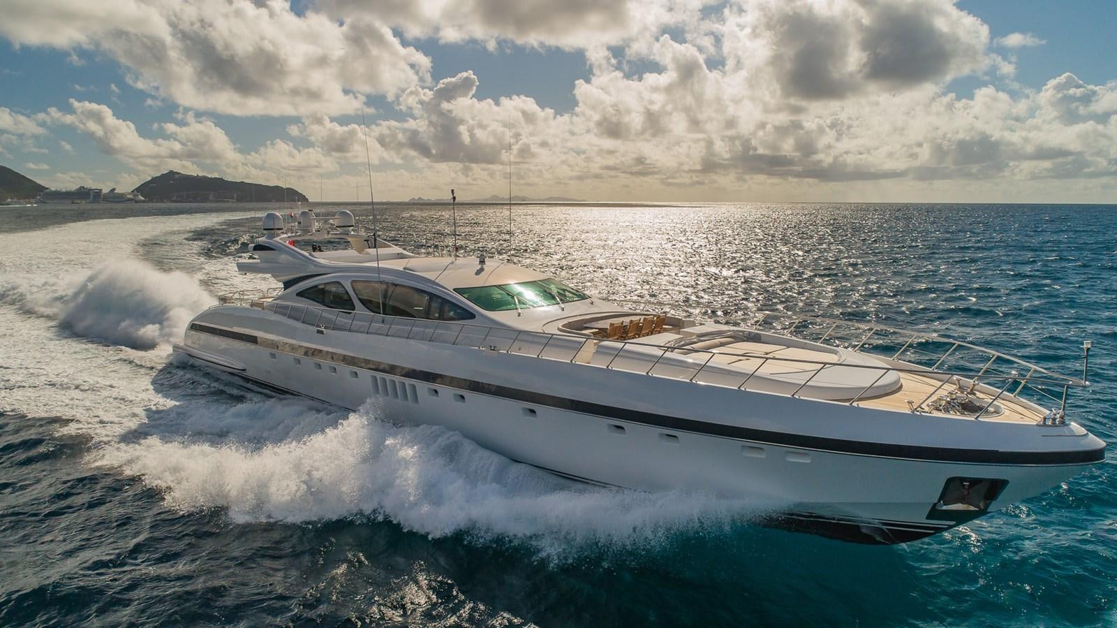 a white yacht on the water aboard JOMAR Yacht for Sale