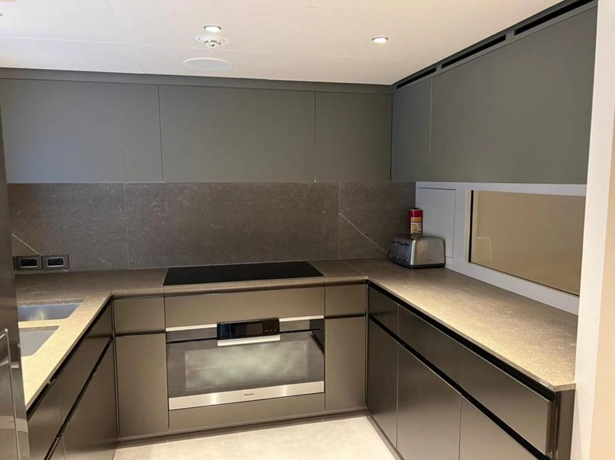 a kitchen with a microwave oven aboard RANDY BETH Yacht for Sale