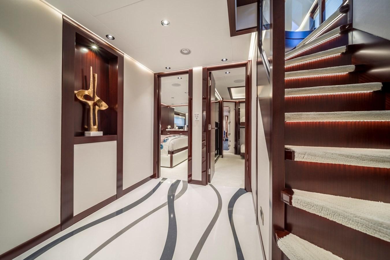 a hallway with a statue aboard LION'S DEN Yacht for Sale