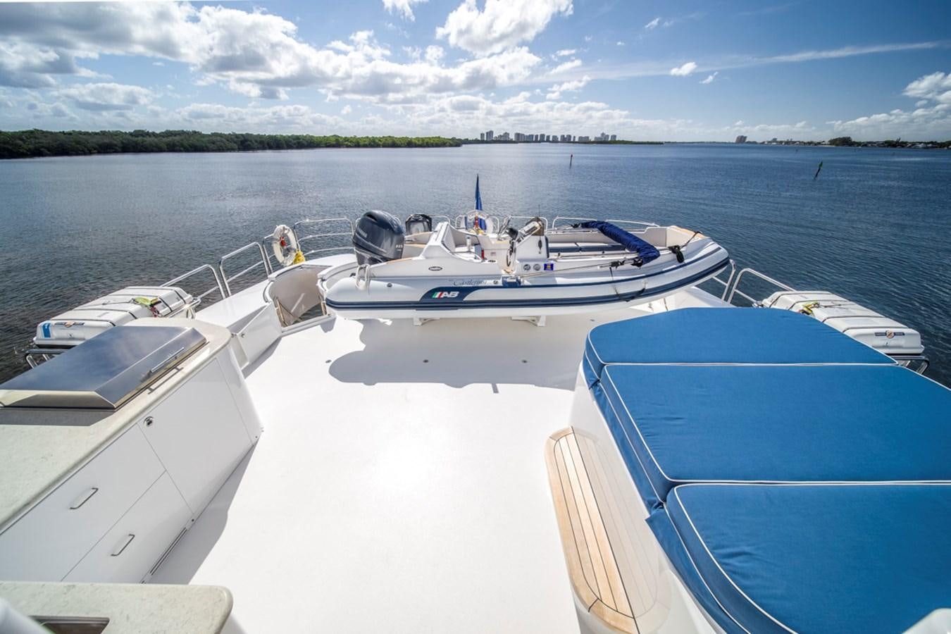 a group of boats on a body of water aboard LION'S DEN Yacht for Sale